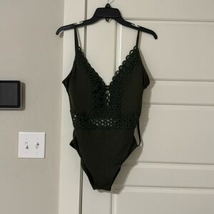One piece bathing suit. Dark green. Size L